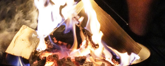 Flannel shirt by a fire